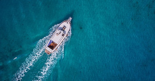 Aerial view of motor boat out on water